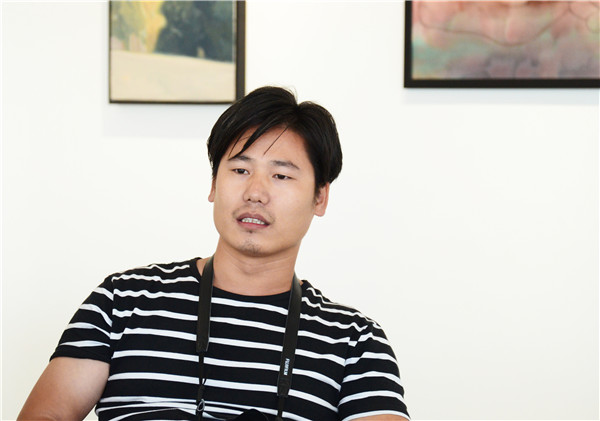 许国磊策展人李海洋讲话林艺术学员尹一分享学习经历展览现场从左至右